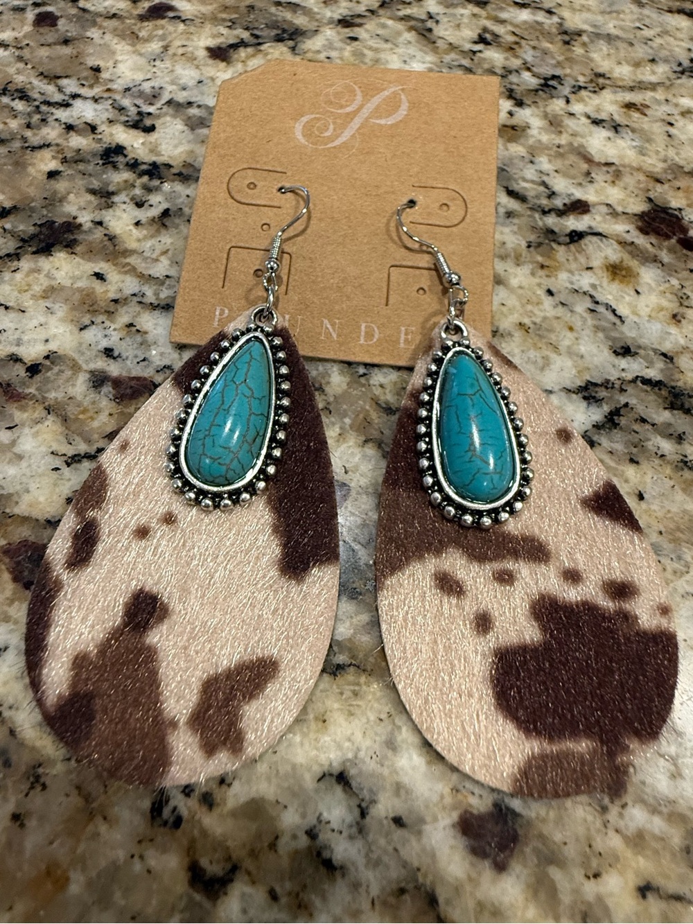 Country western cow pattern turquoise colored beaded dangle earrings